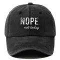 Classic washed black baseball cap featuring bold letter print design, versatile and stylish sunhat. - Adjustable / Black