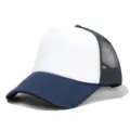 Classic white and navy blue trucker hat with breathable mesh back and sponge front panel. - Adjustable / Navy White