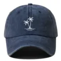 Washed cotton baseball cap with stylish white palm tree print, classic curved brim detail. - Adjustable / Navy Blue