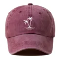 Vintage washed cotton baseball cap featuring embroidered white palm trees detail for summer style. - Adjustable / Burgundy
