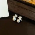 Elegant pearl and zircon flower stud earrings, delicate jewelry detail showcasing sparkle. - Silver Post Flower Pearl Drop Earrings / Silver