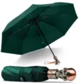 Automatischer Klappschirm in Dunkelgrün mit einzigartigem Metall-Totenkopf-Griff. - 23-Zoll-Regenschirm mit 8 Speichen, Totenkopf-Design, dreifach faltbar, Automatik / Dunkelgrün