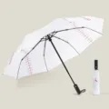 Stylish white folding umbrella with cool baseball seam design, perfect sun and rain protection. - Baseball Umbrella / 27 Inch