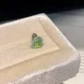 Close-up detail of sparkling colored zircon stud earring displayed in a velvet box. - Single Piece / Green-Cyan-7mm