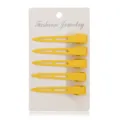 Set of 5 yellow metal duckbill hair clips with cutout design on display card for kids. - 5 Pieces / Yellow