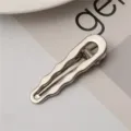 Metallic wavy duckbill hair clip for women, sleek silver side bangs hairpin accessory. - Cloud Hair Claw