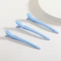 Lot professionnel de pinces à bec de canard en aluminium de 9cm pour coiffure bleu clair. - Bleu ciel