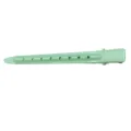 Light green metal duckbill hair clip detailed view, featuring hollow design for sectioning. - Light Green