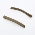 Matte brown hair clip detail, minimalist bobby pin close up showing smooth frosted texture. - Brown