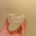 Detailed shot of multi-layer pearl rhinestone gold bracelet, elegant vintage wrist jewelry. - 2# Open Bangles - Gold