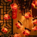 Guirnalda de luces LED Fuwa de Año Nuevo estilo chino festivo lámpara decorativa a pilas - Figuras de niño y niña / 1.5 Metros 10 Luces 2 Secciones Fijo