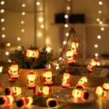 Weihnachtsmann LED Lichterkette, gemütliche warme Feenlichter für die festliche Heimdekoration. - Weihnachtsmann mit Geschenken
