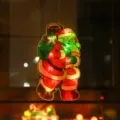 Christmas LED Santa Claus hanging light, window suction cup decor lamp, holiday room glow. - Backpack Santa / 3xAAA Battery Powered