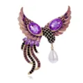 Close-up detail of elegant phoenix bird brooch featuring sparkling purple crystals and hanging pearl. - Phoenix Bird Style (B361-A)