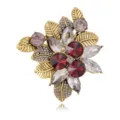 Vintage crystal flower brooch for women, elegant gold-tone rhinestone lapel pin accessory. - B349-A