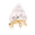 Close-up detail view of the exquisite hermit crab and seashell rhinestone enamel brooch. - Pink White