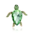 Close-up detail of the elegant green crystal turtle brooch with sparkling rhinestone accents. - Sea Turtle Shape (C929-A) / Green
