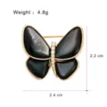 Close-up detail of the elegant black shell butterfly brooch showcasing exquisite craftsmanship. - G007-H