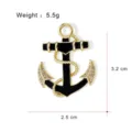 Detailed close-up of a stylish gold-plated black enamel anchor brooch with sparkly rhinestone accents. - Anchor Shape Rhinestone Style (G037-H)