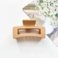 Minimalist matte rectangular hair claw clip in elegant apricot, perfect for daily elegant styles. - Matte Ginger