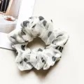 Detailed shot of sweet chiffon rhinestone hair scrunchie with cute heart pattern for daily wear. - Heart Black