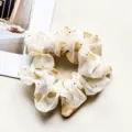 Chiffon rhinestone hair scrunchie detail view, elegant sheer fabric with sparkling crystal accents. - Heart Yellow