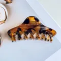 Tortoiseshell hair claw clip for women, stylish acrylic shark clip detail close up. - Glossy Coffee Leopard