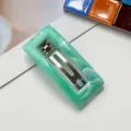 Green marble resin hair clip detail view, elegant rectangular barrette with secure metal clasp. - Emerald Green