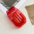 Red transparent flat hair claw clip, large oval geometric hollow design for women daily hair styling. - Red
