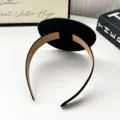 Graduation cap headband detail shot, black hair hoop with mini mortarboard prop decor. - Dome Style / 1 Piece/Pack / Black