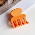 Matte orange kleine Haarklammer mit vier Zähnen für stilvolle hohe Pferdeschwänze Frisuren. - Matt Orange