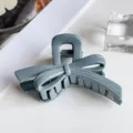 Close-up detail of grey bow hair claw clip, elegant large shark clip accessory for styling. - Bowknot Style (PC 7cm Bowknot Clip) / Glossy Blue Gray