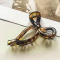 Elegante Haarklammer in Schildpatt-Optik, geometrische Schleifen-Haarspange für den Alltag. - Hohle Schleife Stil / 10cm / Glänzend Schildpatt