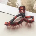 Elegante Haarklammer mit Schildpatt-Muster, Schleifen-Design und geometrischer Aussparung. - Hohle Schleife Stil / 10cm / Mattiertes Schildpatt