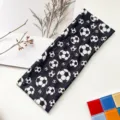 Detailed shot of elastic black and white football pattern sports headband for sports. - 8.5cm Soccer Headband / Black