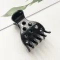 Black hollow hair claw clip detail, stylish grip clip for daily thick hair styling. - Glossy Black