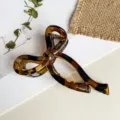 Elegante Schildpatt Schleife Haarklammer, modische Acryl Haarkralle für stilvolles tägliches Styling. - 10cm / Glänzend Schildpatt