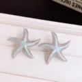 Boucles d'oreilles clous étoile de mer en émail bleu, bijoux fantaisie argentés. - Boucles d'oreilles clous étoile de mer en émail (47#) / Argent-Bleu