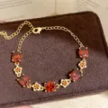 Luxe 18k vergulde ovale rode kristal en bloem zirkoon armband elegante mode sieraden - Goud/Rood