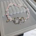 Multi-strand pearl pink bead necklace with metallic flower charm, elegant clavicle chain. - 18# Necklace - Silver - Pink - White