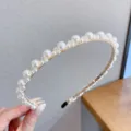 Elegant gold-tone metal headband decorated with cascading faux pearls for women and girls. - Large and Small Artificial Pearls Headband