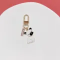 Cute cartoon dog keychain metal alloy gold hardware bag charm detailed view pendant accessory - Sitting Dog (3蹲地狗)