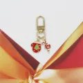 Christmas themed alloy keychain charm with mitten and candy cane design, detailed accessory. - Christmas Glove And Candy Cane Style (2) / Red & Gold