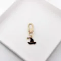 Detailed close-up view of the Halloween witch hat metal keychain pendant, fine craftsmanship. - Witch Hat