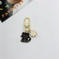 Cute metal alloy black cat and daisy flower charm keychain for women bag and keys accessory. - Black Cat