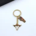 Amerikaanse cowboy premiejager sleutelhanger Westerse legering tas hanger accessoire - Stierenschedel en Holster Stijl (4)