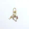 Cute alloy cat and fish bone keychain pendant, golden metal finish, bag charm detail. - Grey Cat Style (1)