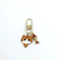 Detailed close-up shot of the cute alloy cat and fish skeleton keyring bag charm. - Ginger Cat Style (5)