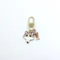 Detailed view of the cute cat and fish bone alloy metal keychain charm, perfect for bags. - Light Grey Cat Style (6)