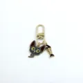 Close-up detail shot of the cute alloy cat head and fish bone charm keychain pendant accessory. - Black Cat Style (9)
